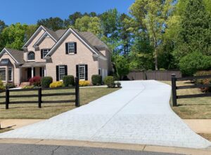 concrete driveway with stamped concrete to look like brick