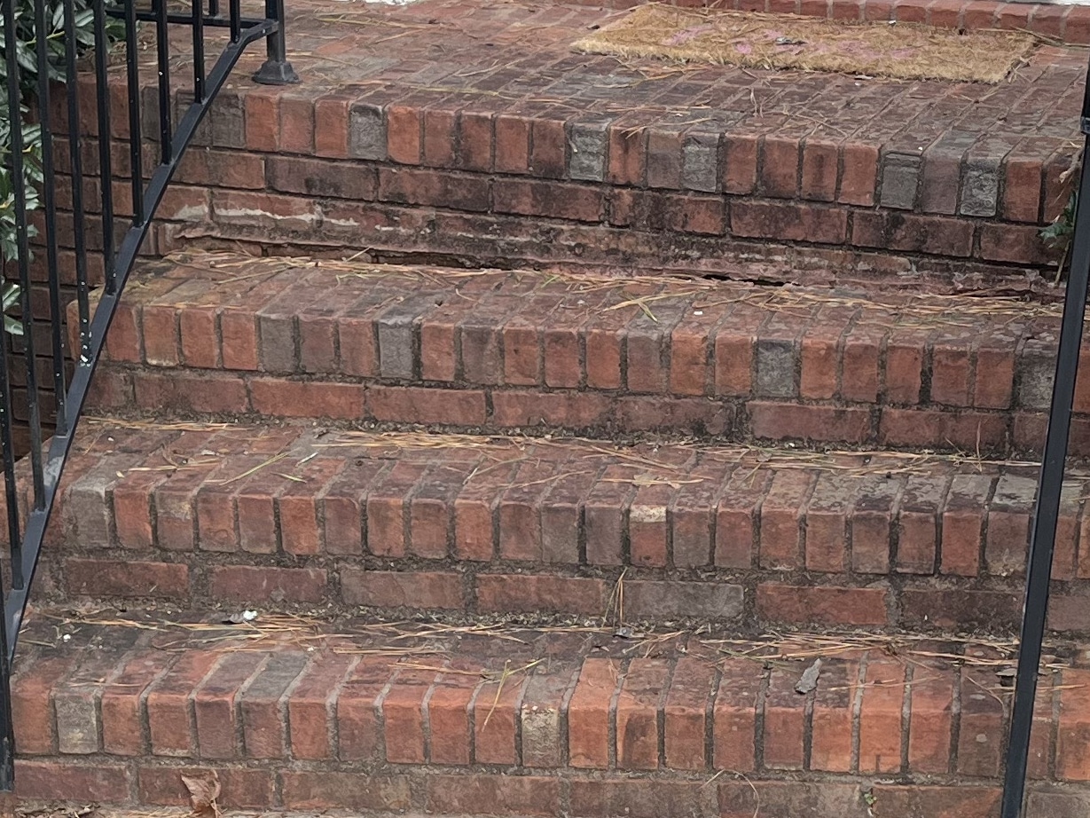 Older, settling brick stairway