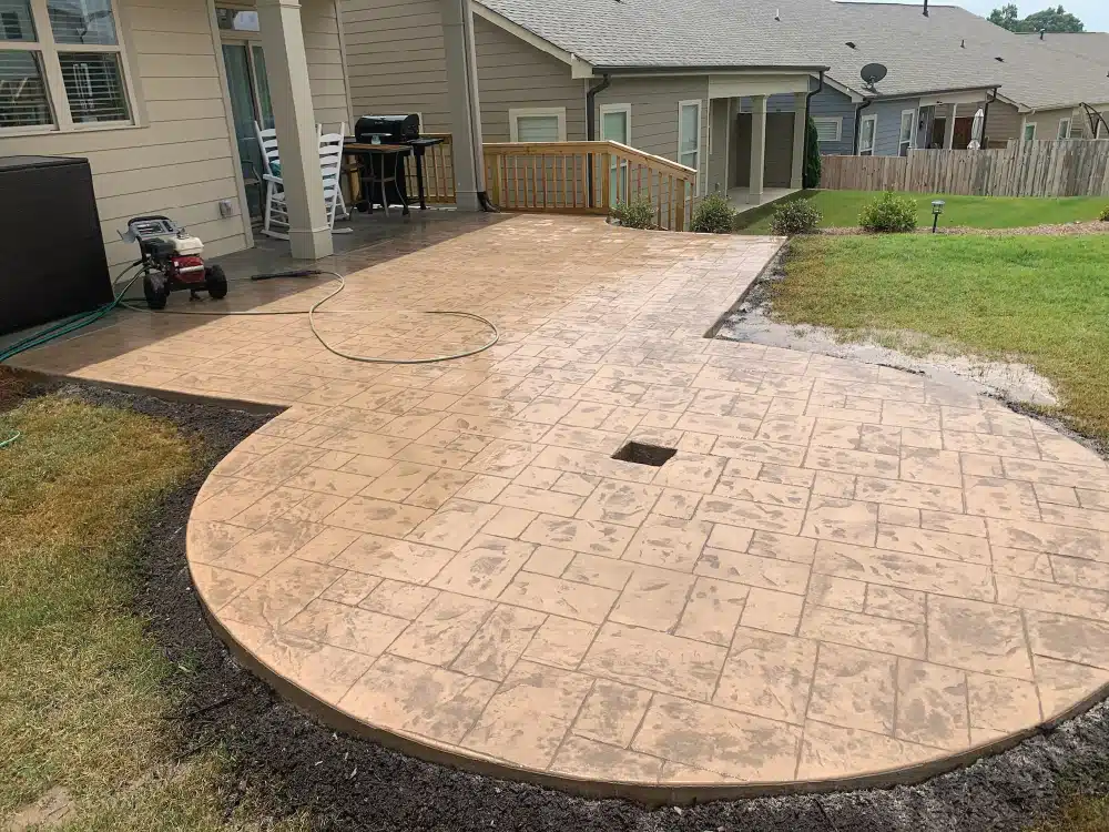 Stamped concrete patio, perfect for outdoor gatherings and relaxation.